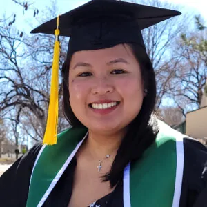 Steffi Omadio Headshot in her graduation attire