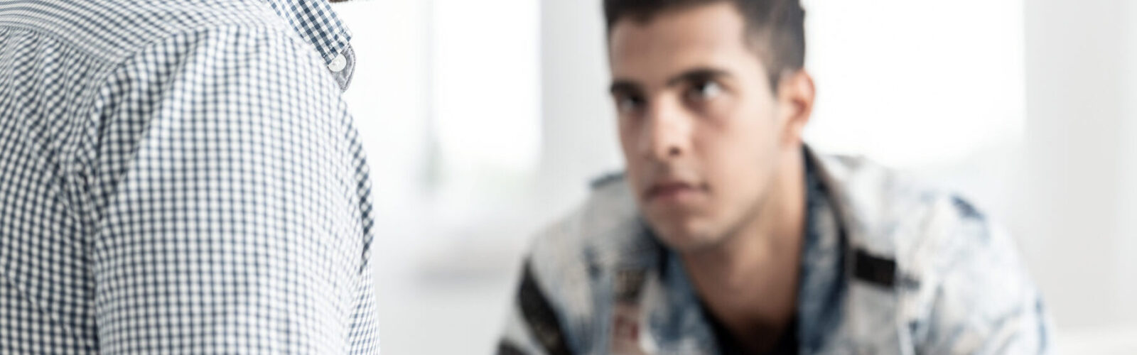 young man talking to a provider