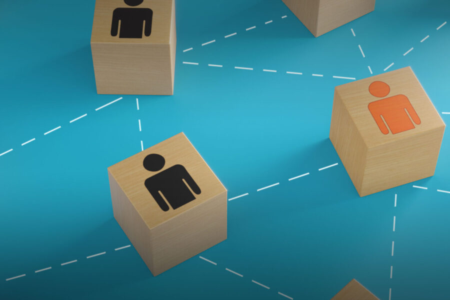 blocks with human icon on a map of connecting dots