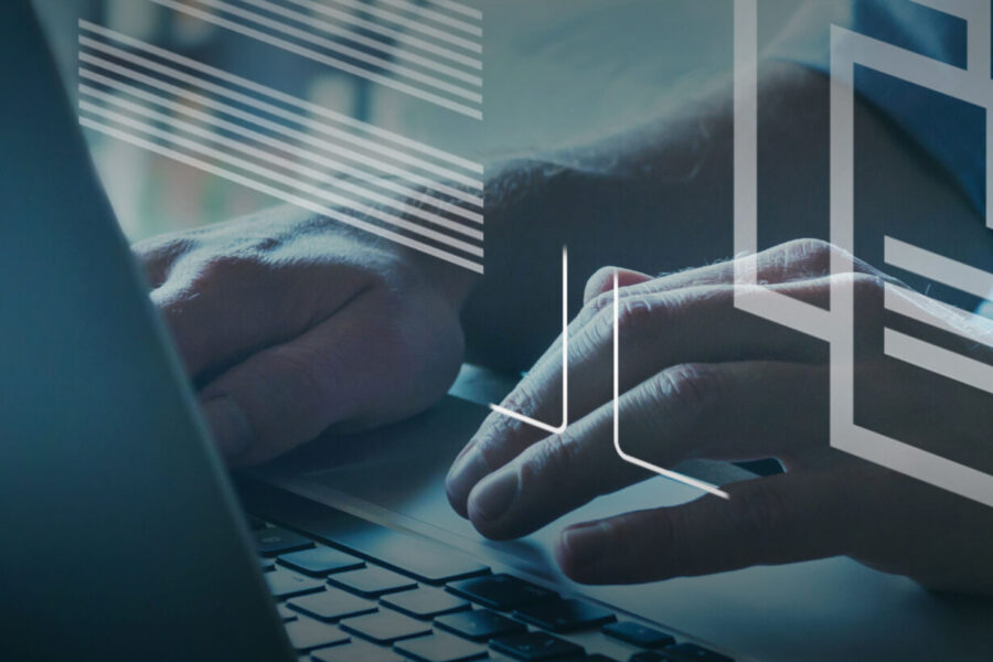 person typing on laptop with paper icons superimposed on overlay