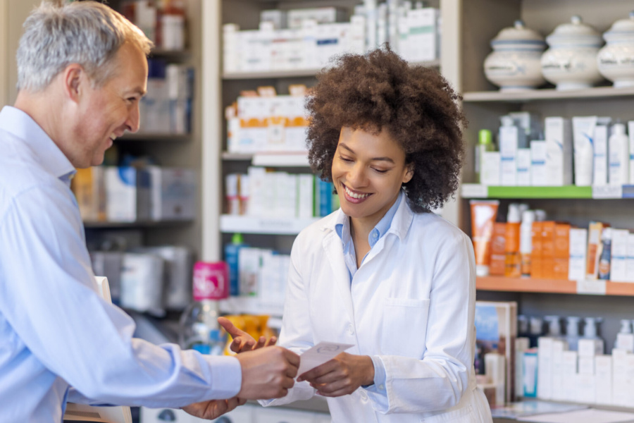 Pharmacist working with a patient