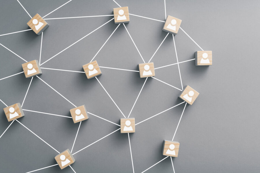 blocks with person icon printed on them and are connected by intersecting lines