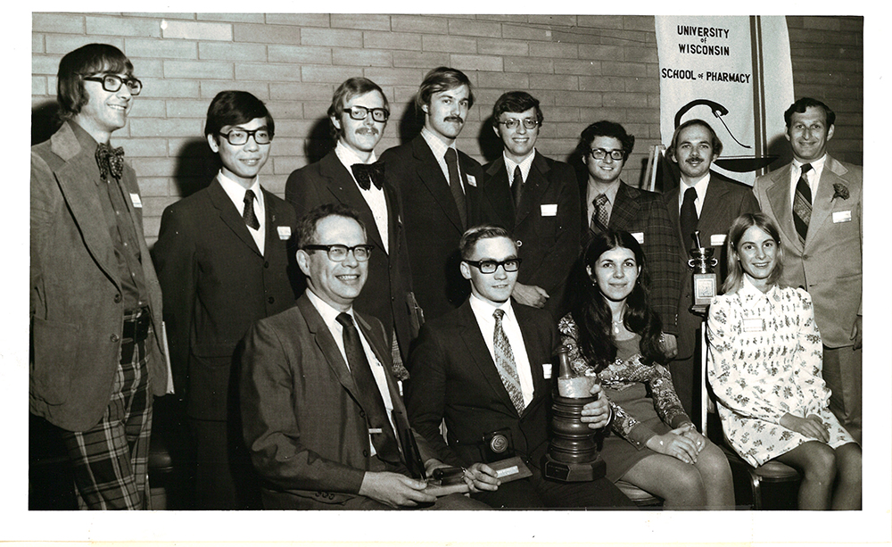 A black-and-white group photo with David Pearlman.