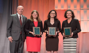 L-r: AACP President, Dr. Joseph DiPiro, presents Andrea Porter, Casey Gallimore, and Susanne Barnett with the 2017 Rufus A. Lyman Award.