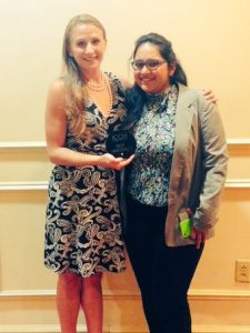 Joanne M. Peters (left) and Karishma Desai accepting the award.