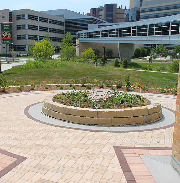 The Legacy Walk is a part of the Medicinal Garden adjacent to the entrance to Rennebohm Hall.