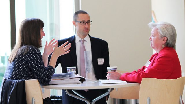 Joe Zorek speaking with Jeanette Roberts and another woman