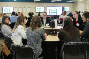 Joe Zorek (center facing), assistant professor (CHS) in the Pharmacy Practice Division, participated in the roundtable discussion. 