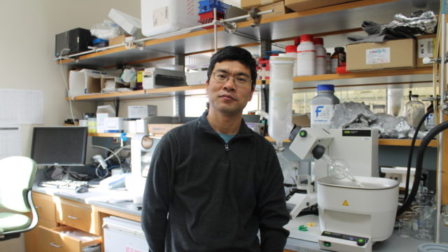 Weiping Tang in his lab