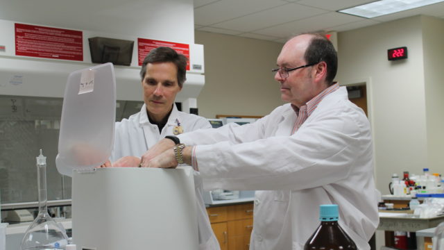 Mark Sacchetti and Ed Elder working together in the lab