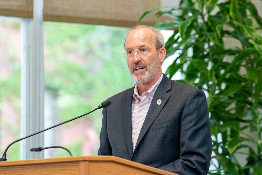 Dave Mott speaks at the podium.