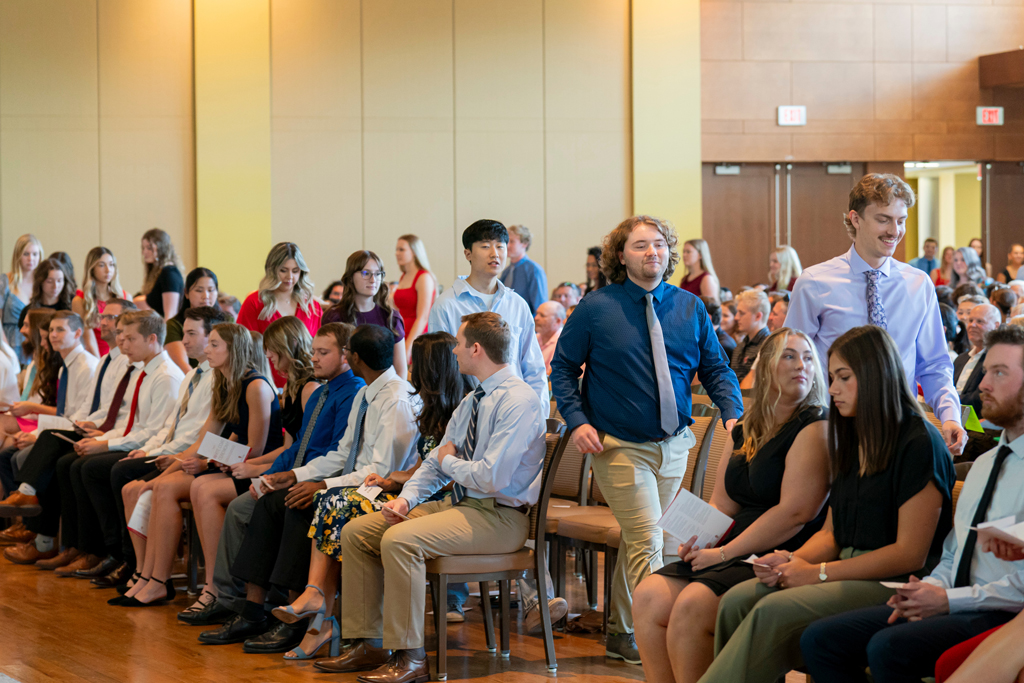 Pharmacy students filling into their seats