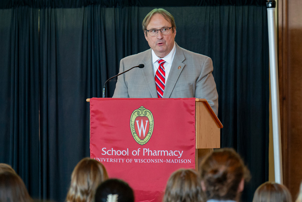 Dean Steve Swanson speaking at podium