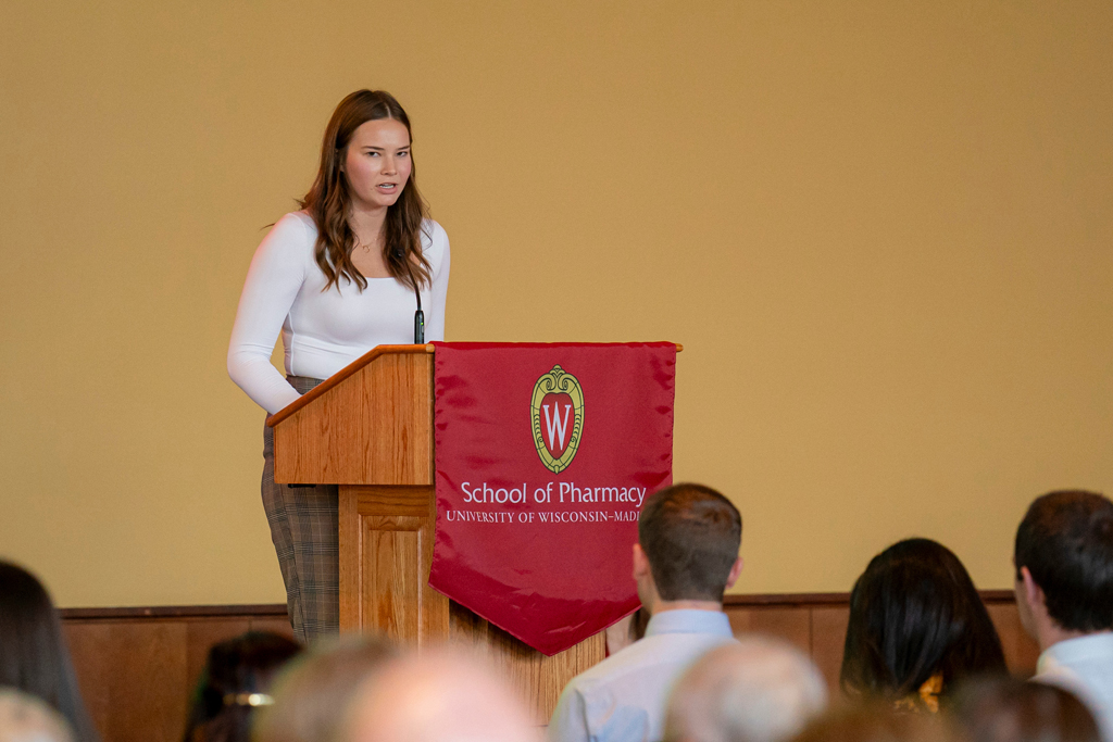 Student speaking at podium