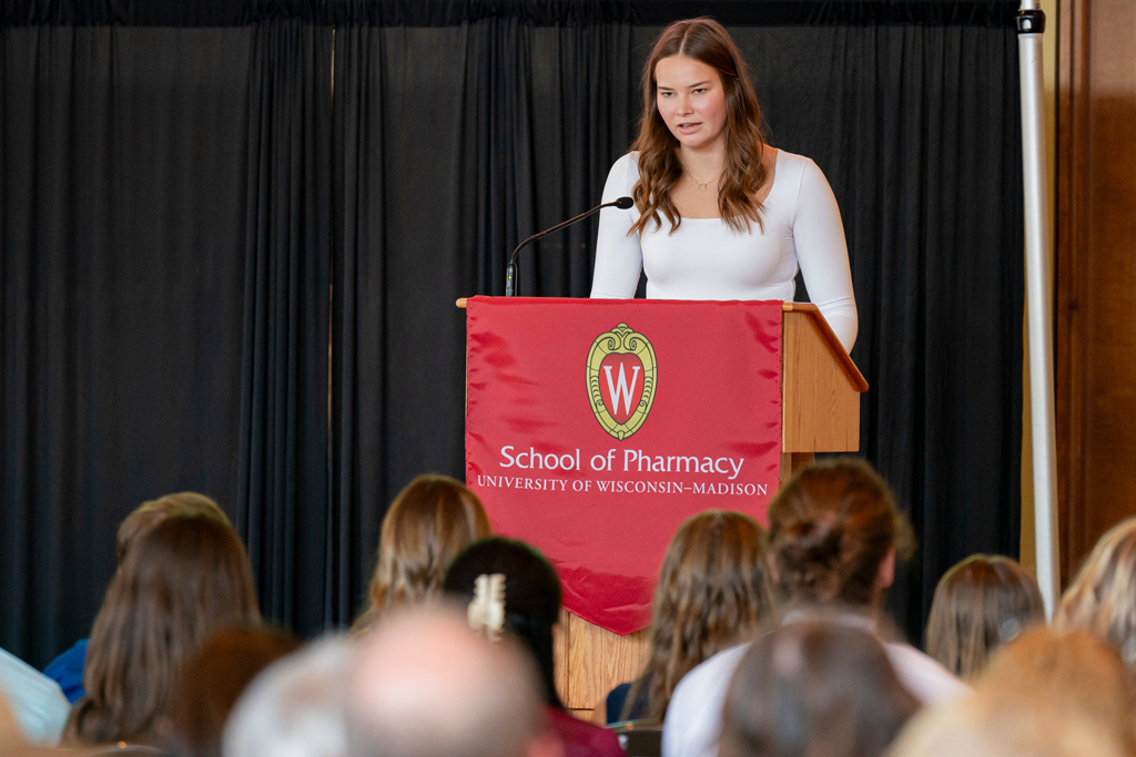 Student speaking at podium