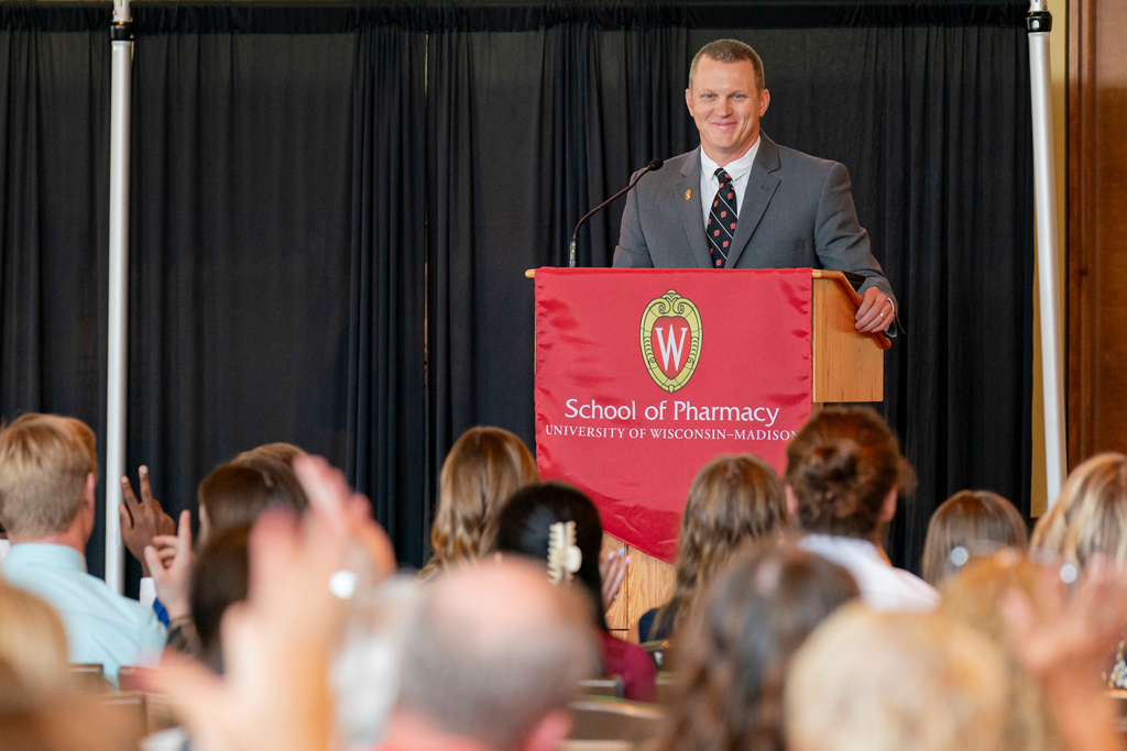 Man speaking at podium