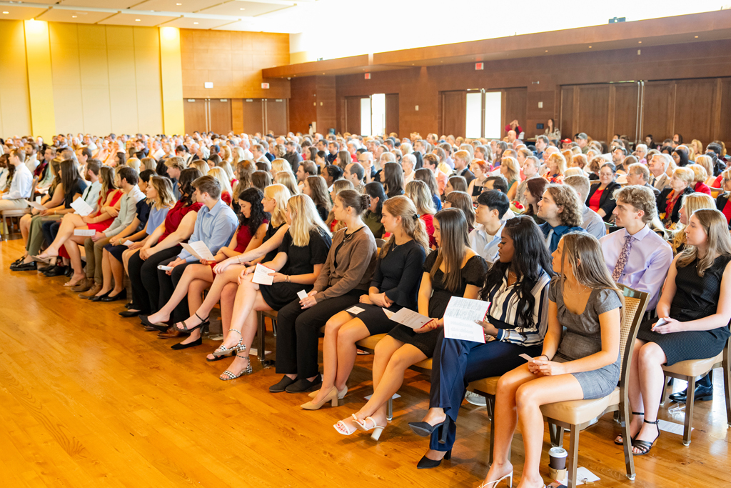 Audience of parents and students at White Coat Ceremony