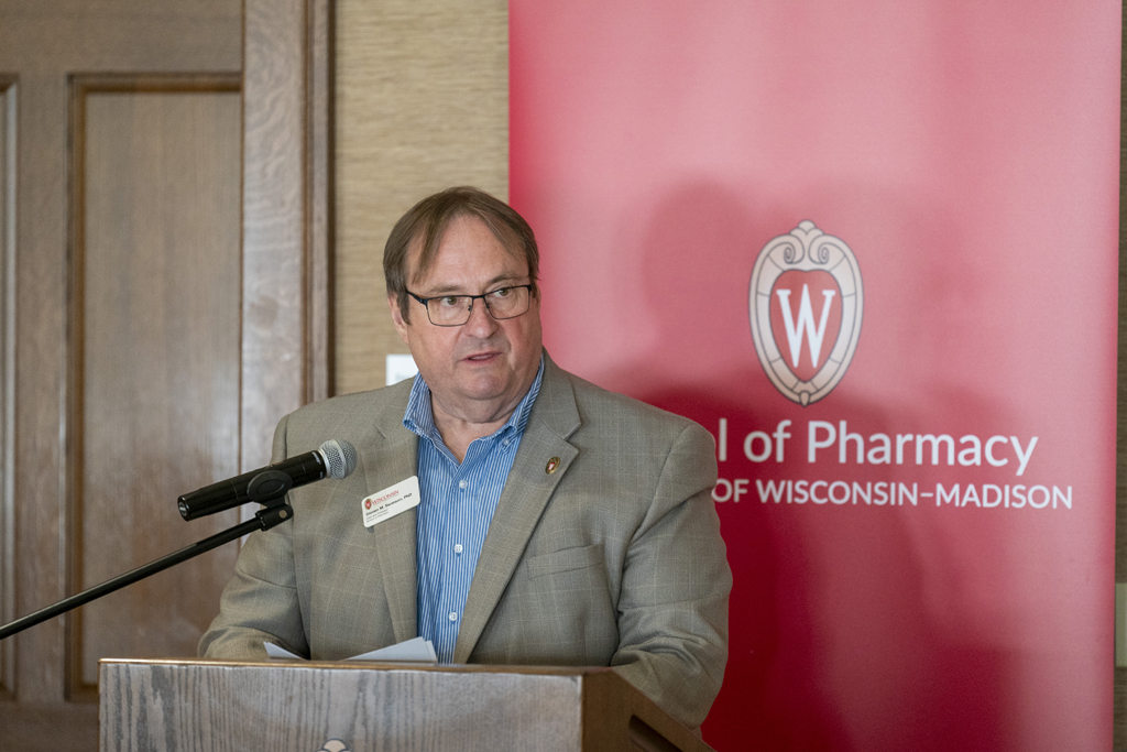 Dean Steve Swanson speaks at the podium