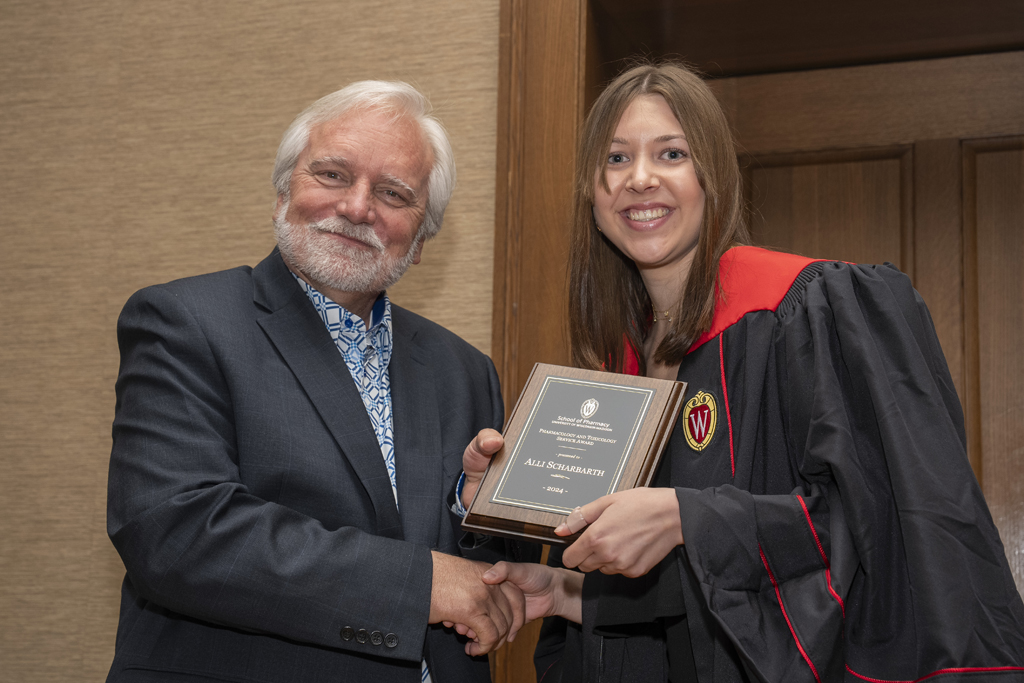Alli Scharbarth receives an award