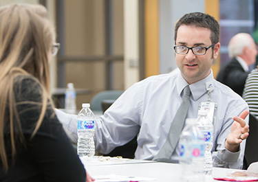A SoP alum talks with an undergraduate student about careers in pharmacy