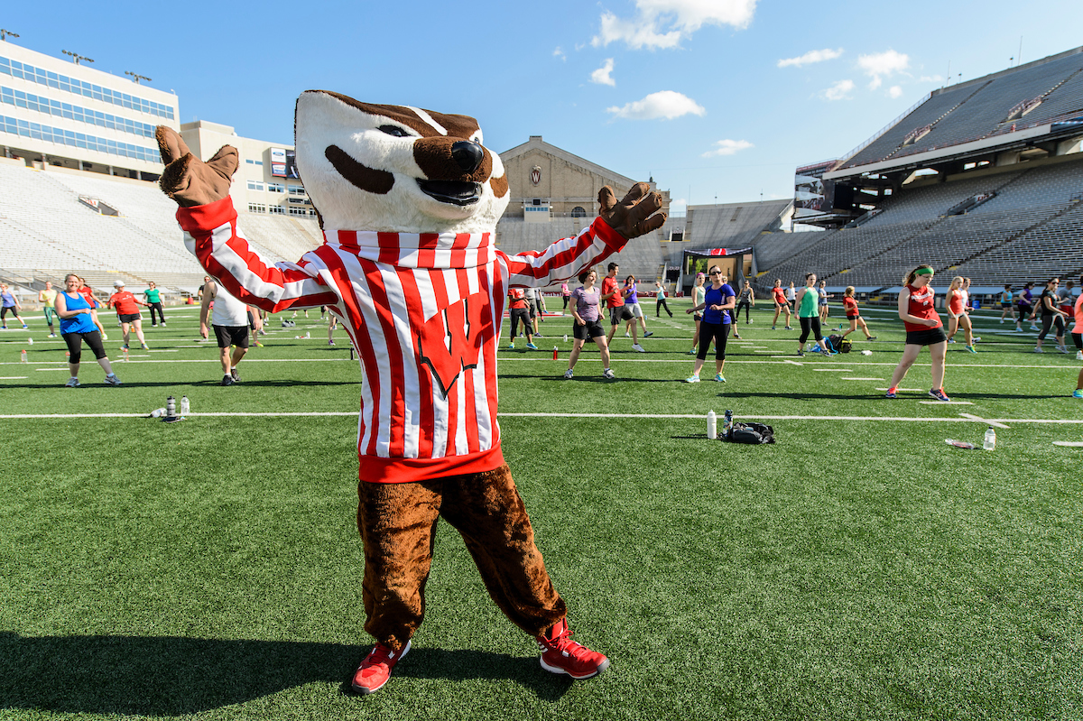 Bucky leads a workout on football field