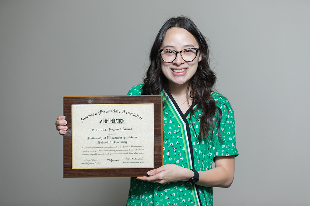 Clara Nickel holding a plaquard