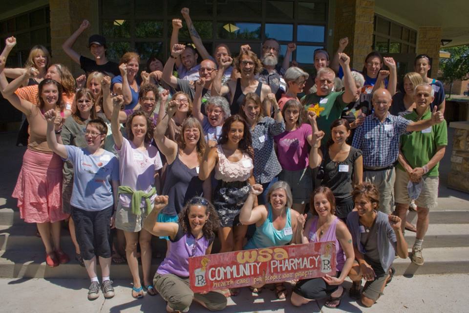 A large group photo of attendees of the 40 year reunion of Community Pharmacy employees in 2012.