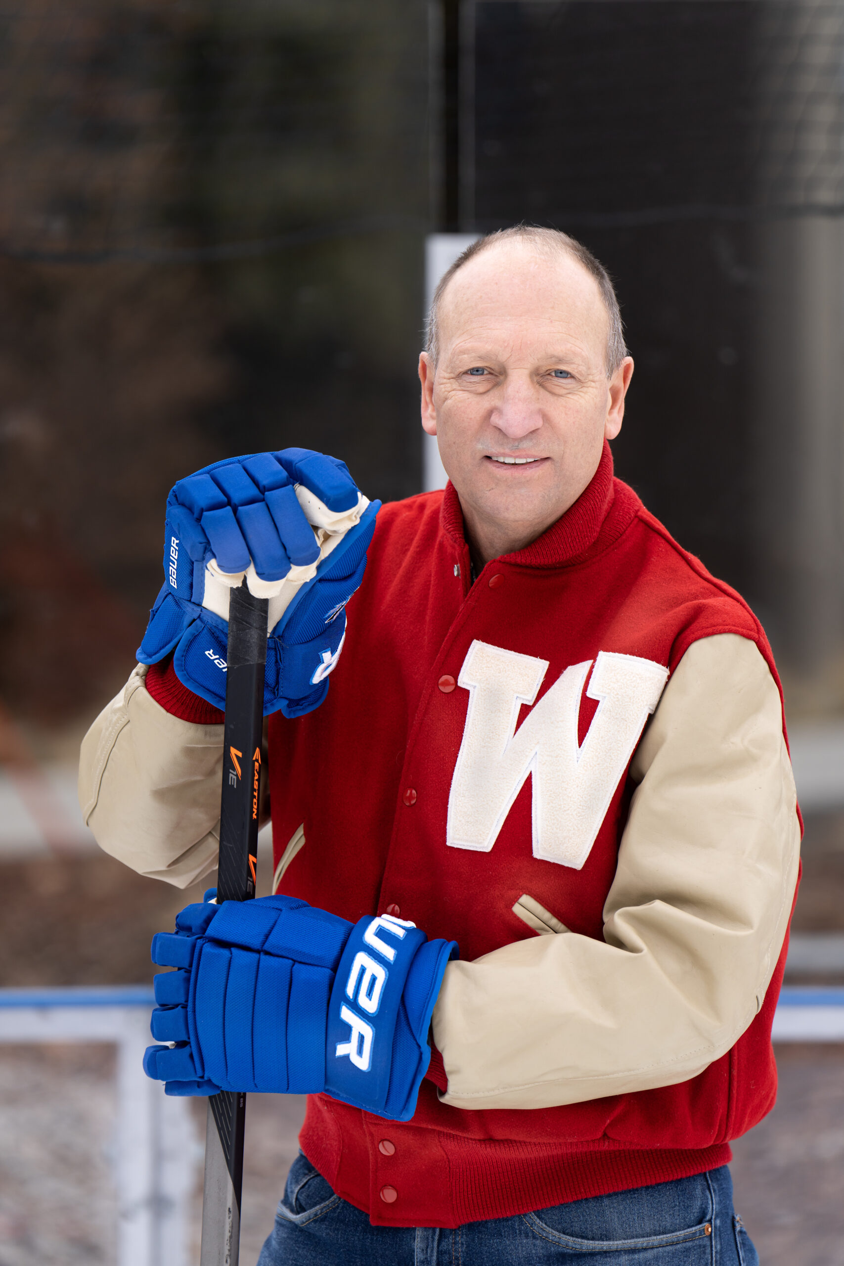 Ed Lebler holding a hockey stick