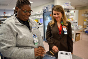 Melissa Ortega (right) with a colleague at Tufts Medical Center