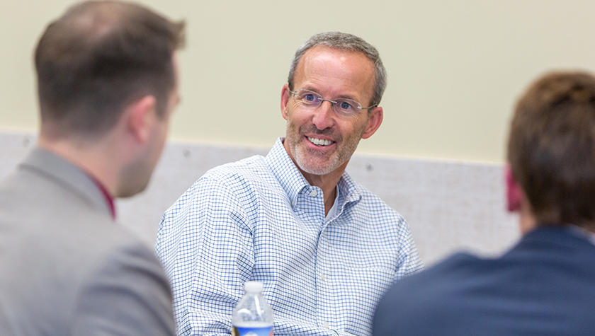 Dave Mott in a meeting