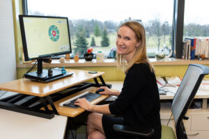 Erika Smith at her desk