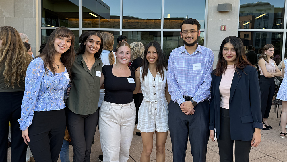 PharmTox students Lauren Krueger, Samira Pal, Jaqueline Wallin, Paulina Esguarra, Yazan Hammad, and Nandini Saluja standing outside a reception
