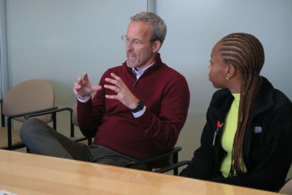 Dave Mott speaking and gesturing with his hands during a SoP meeting