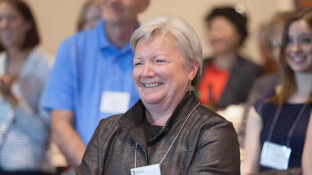Jeanette Roberts listening to speaker