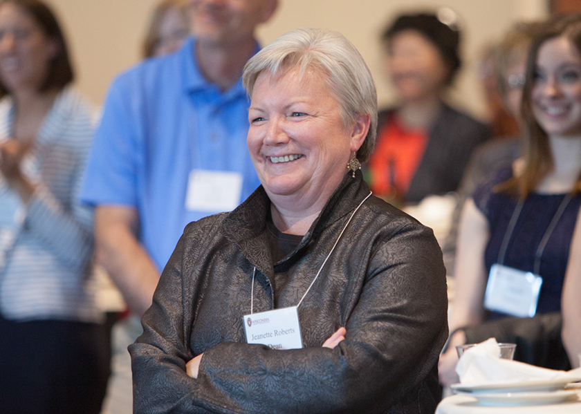 Jeanette Roberts listening to speaker