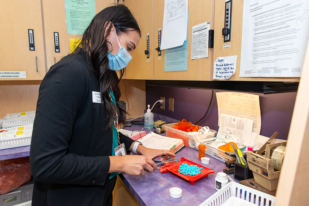 Kymberly Ludwig preparing medications