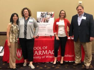 Michelle Chui, Sarah Sorum, Kate Rotzenberg, Steve Swanson at a PEARL Rx information booth.