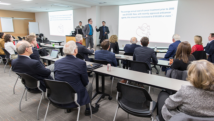 Dean Bowen, Graham Edwardson, Griffin Budde presenting in the SHARx Tank.