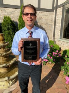 Peter Langenstroer with his award