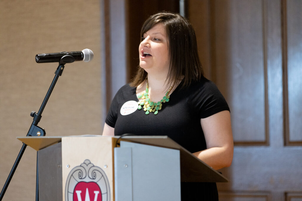 Kendra Gurnee speaks at the podium.