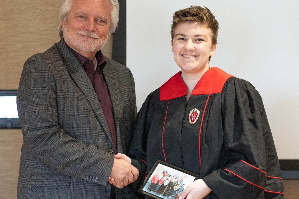 Jeff Johnson and a PharmTox graduate pose for a photo.