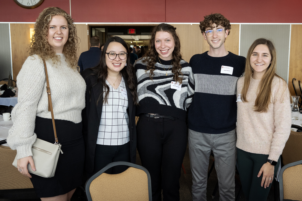 PharmD students smiling arm-in-arm together