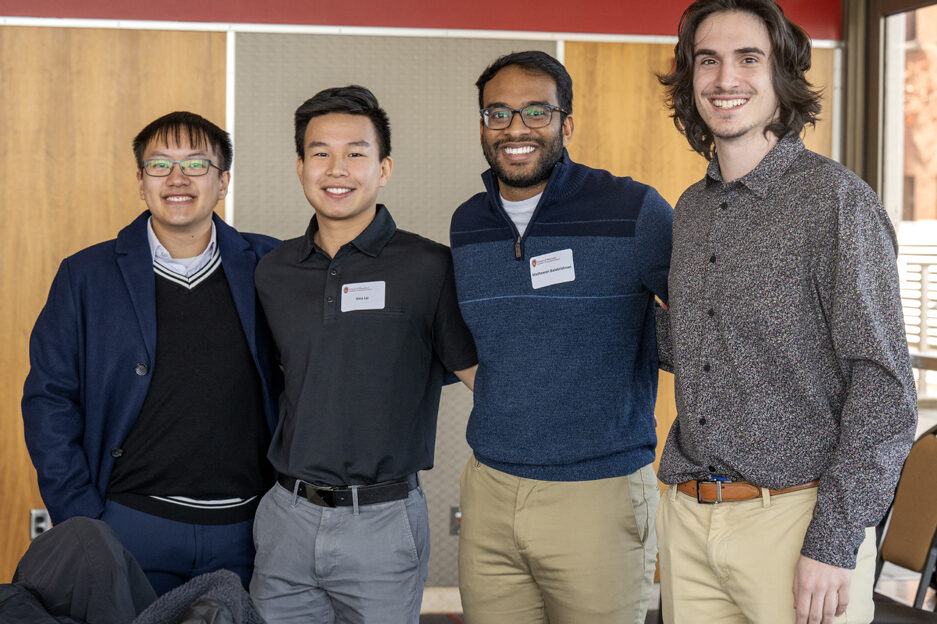 Lucas Thao, Alex Lai, Mathawan Balakrishinan, and Michael Milano standing arm-in-arm with ascending heights