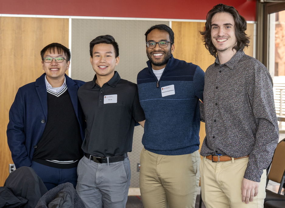 Lucas Thao, Alex Lai, Mathawan Balakrishinan, and Michael Milano standing arm-in-arm with ascending heights