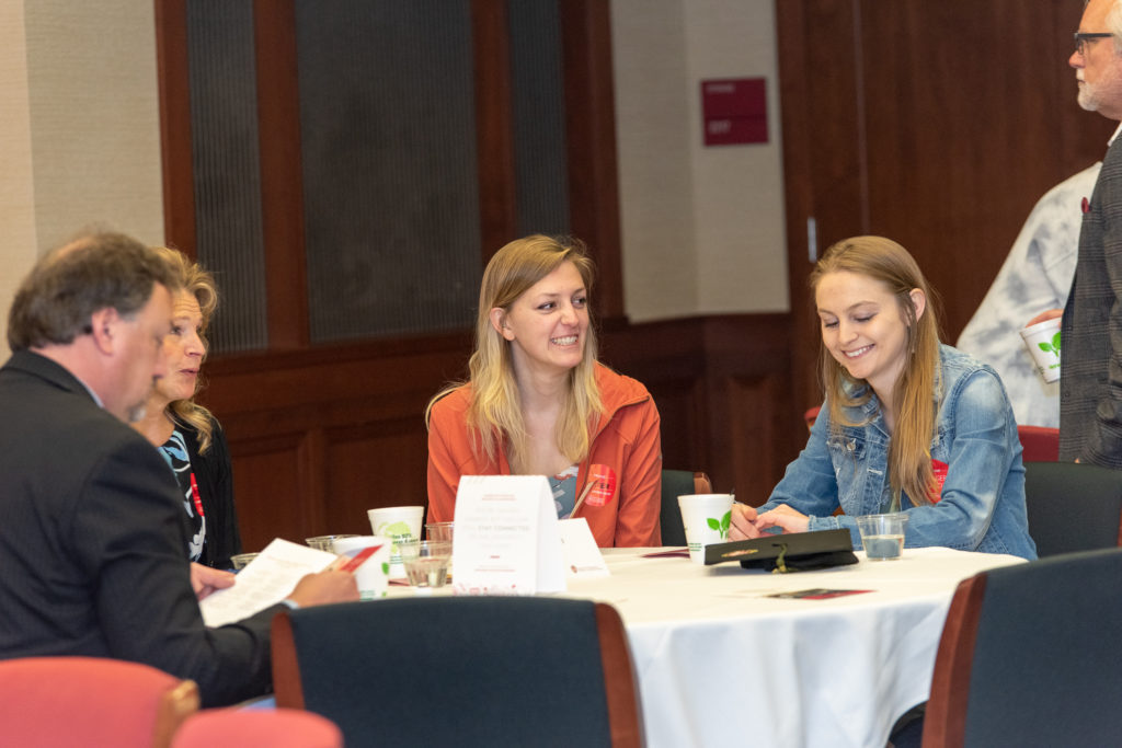 The conversations during the breakfast engage students.