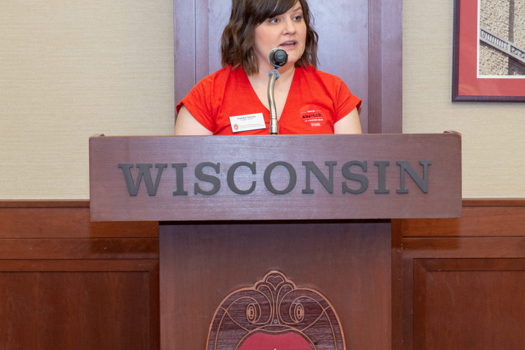 Kendra Gurnee, student service coordinator, congrats students for their achievement at the ceremony.