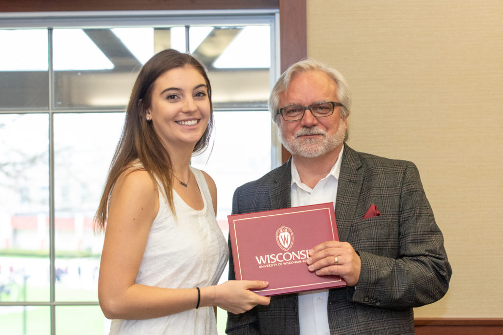 Students receive their diploma from Professor Jeff Johnson.