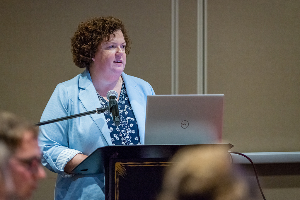 Sarah Sorum speaks at a podium