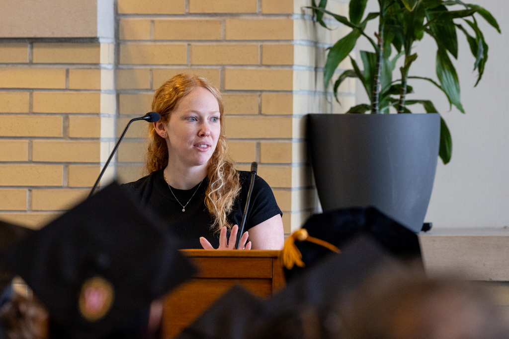 Heather Spatchek speaks at the podium