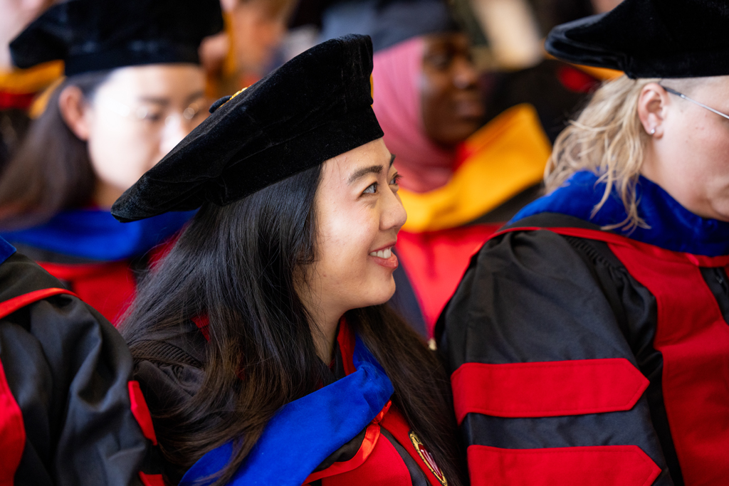 Graduates listen to the speakers